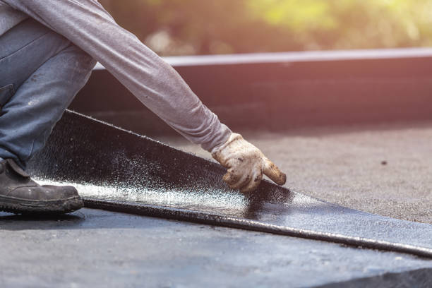 Professional Waterproofing technician working in Bellmore, NY